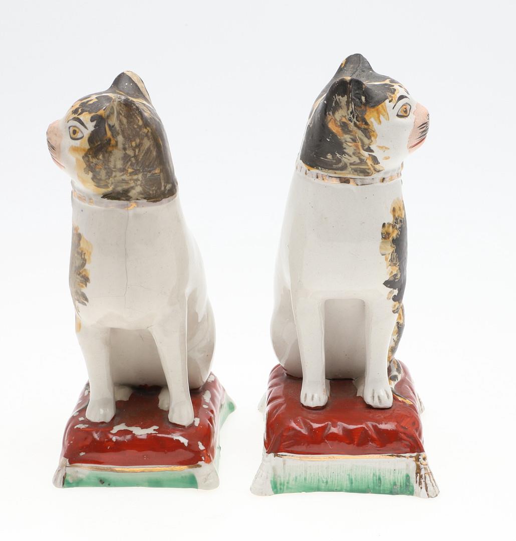 A pair of Staffordshire ceramic cats, circa 1860