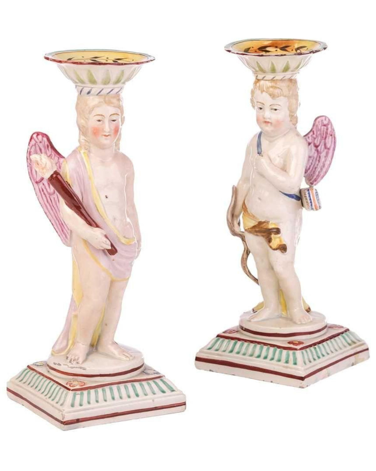 A Pair Of Early Staffordshire Ceramic Candlesticks Shaped As Putti, circa 1800