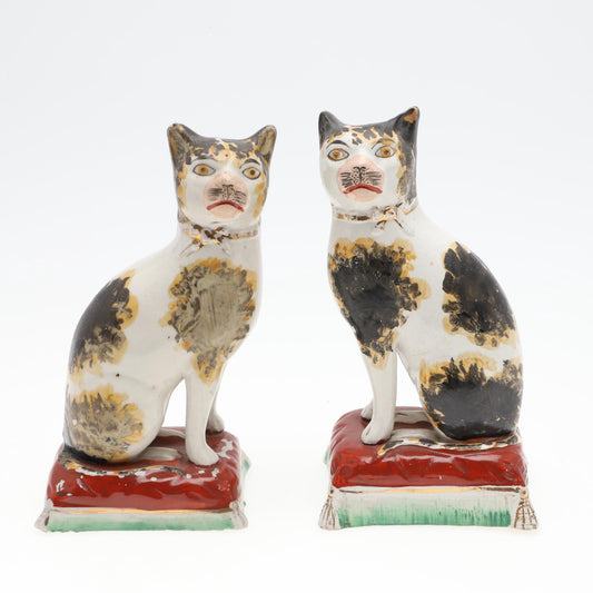 A pair of Staffordshire ceramic cats, circa 1860