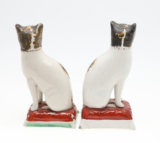 A pair of Staffordshire ceramic cats, circa 1860