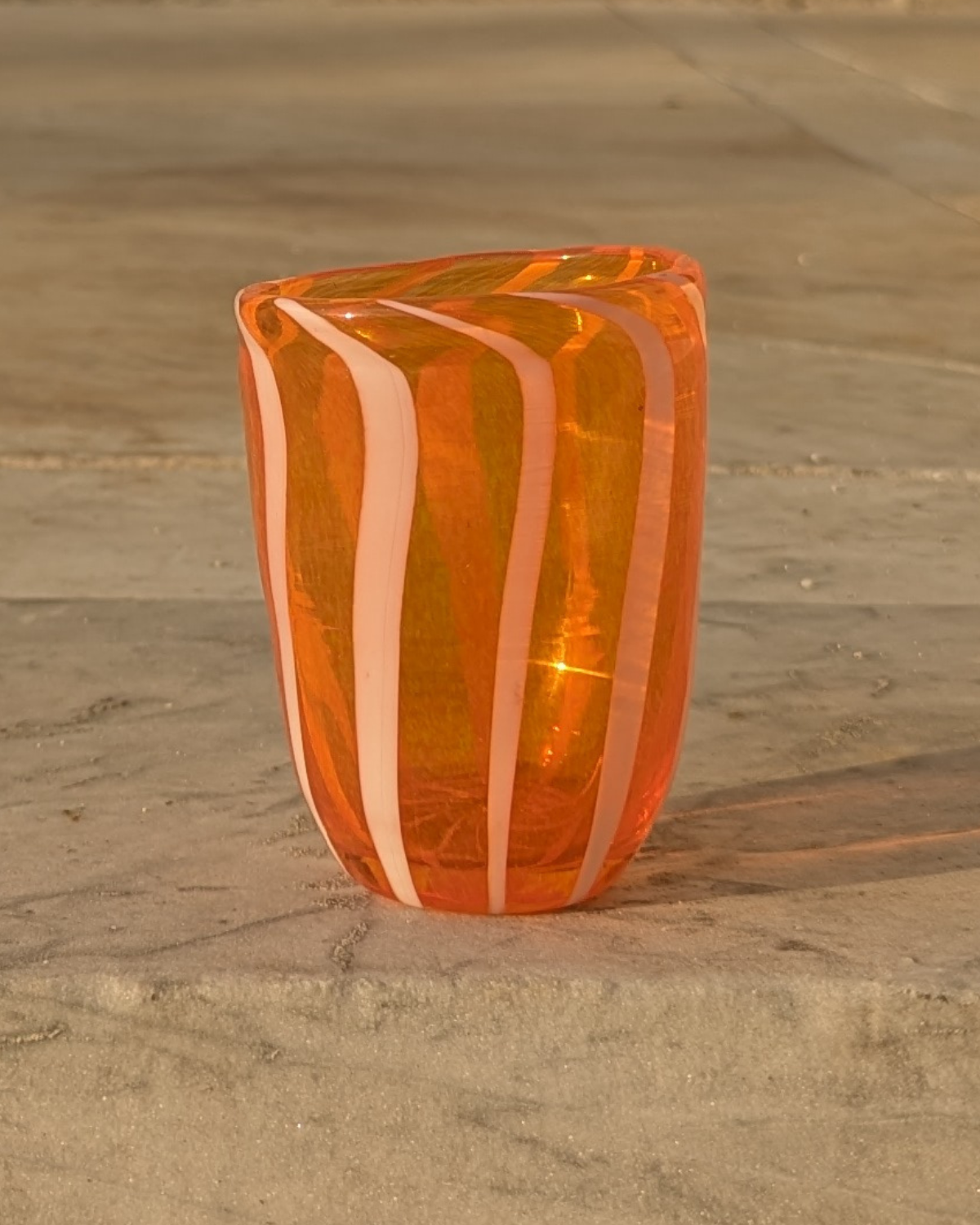 Stripey glass tumbler in white and orange