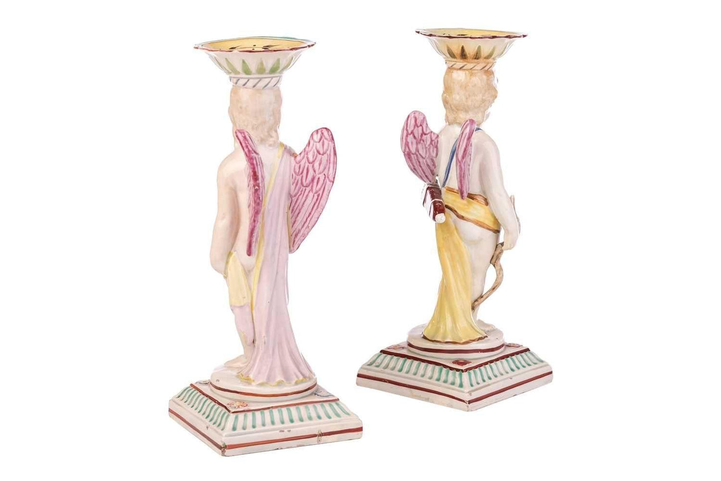 A Pair Of Early Staffordshire Ceramic Candlesticks Shaped As Putti, circa 1800