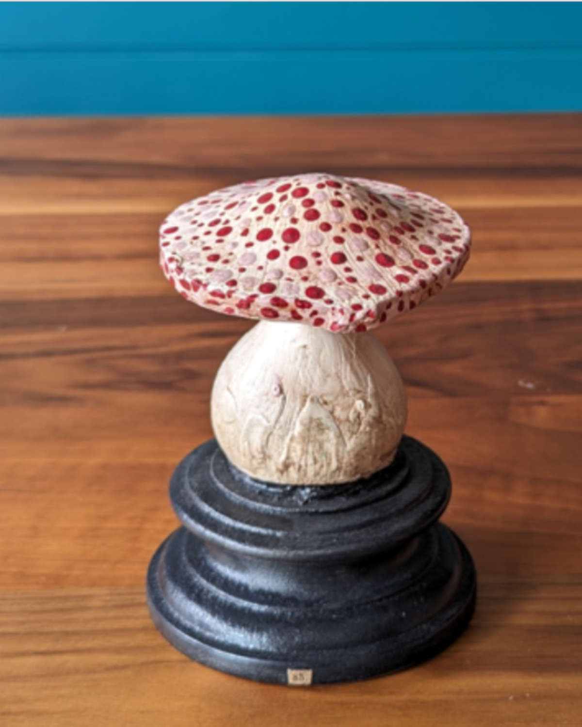 An antique botanical model of a mushroom