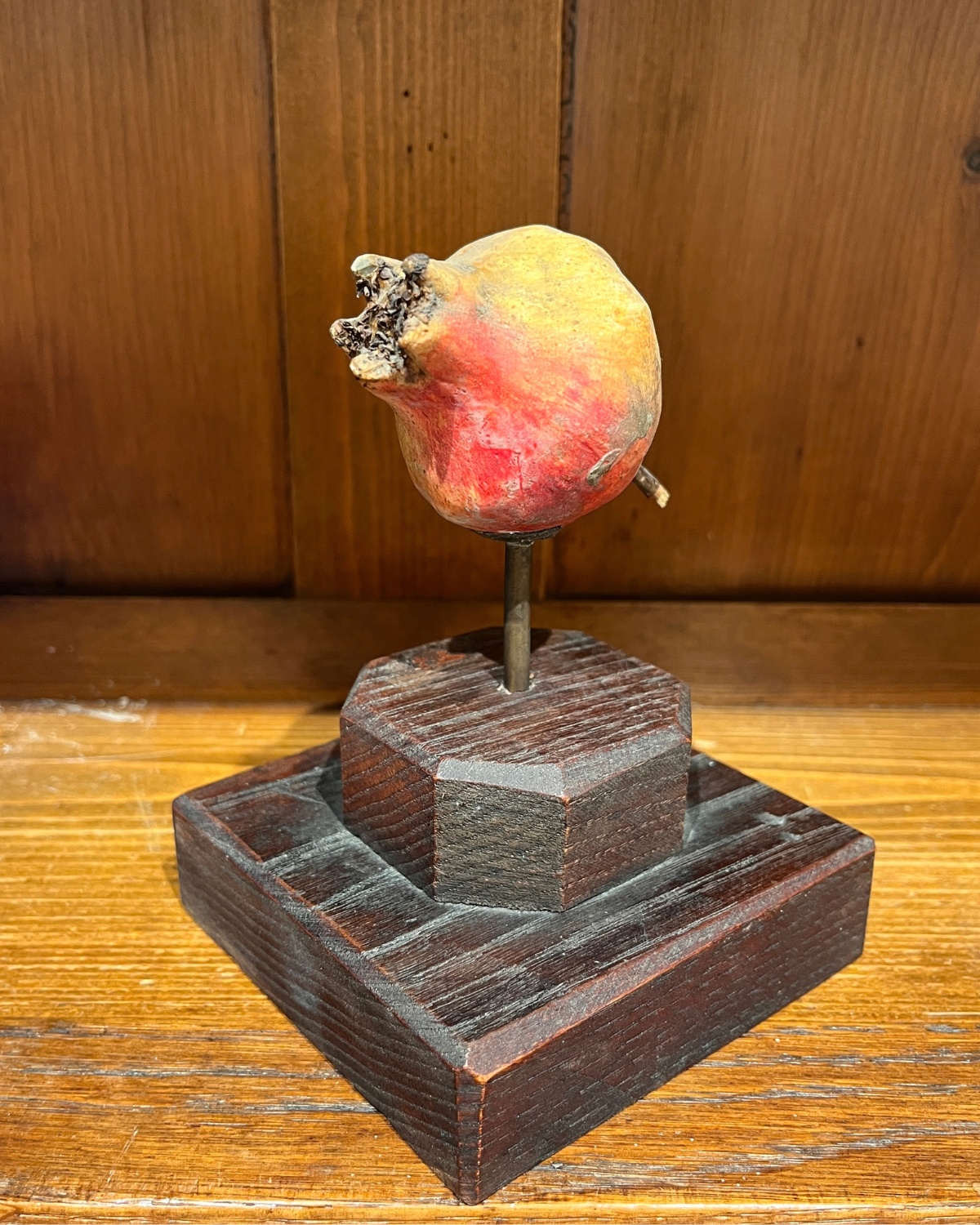 A painted gesso botanical model of a pomegranate, early 20th century