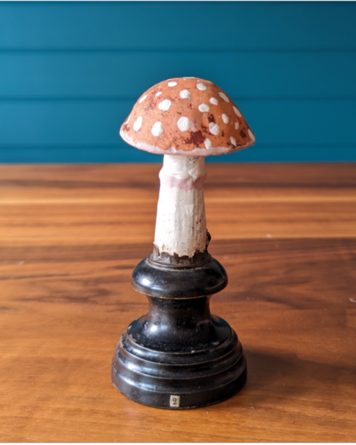 An antique botanical model of a mushroom