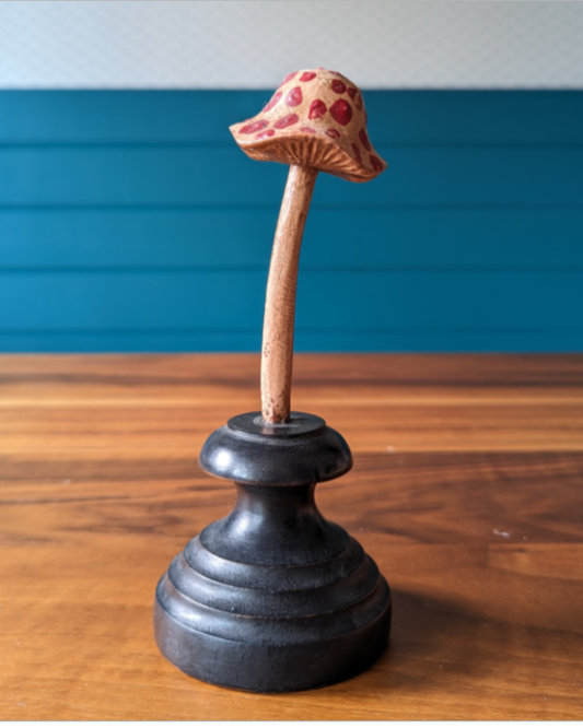 An antique botanical model of a mushroom