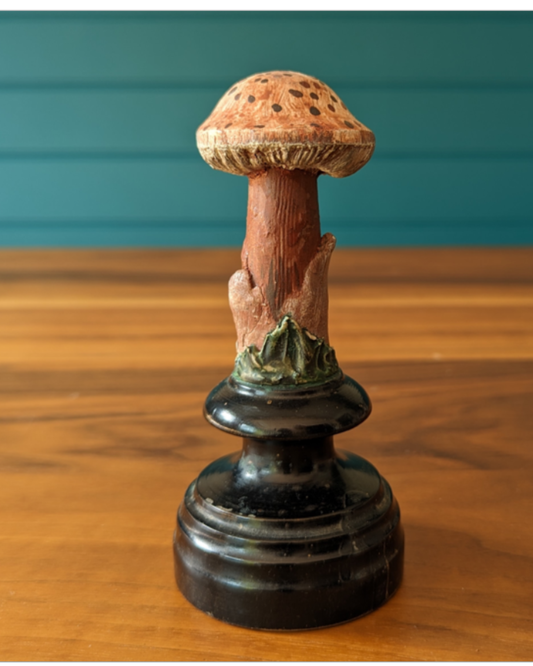 An antique botanical model of a mushroom