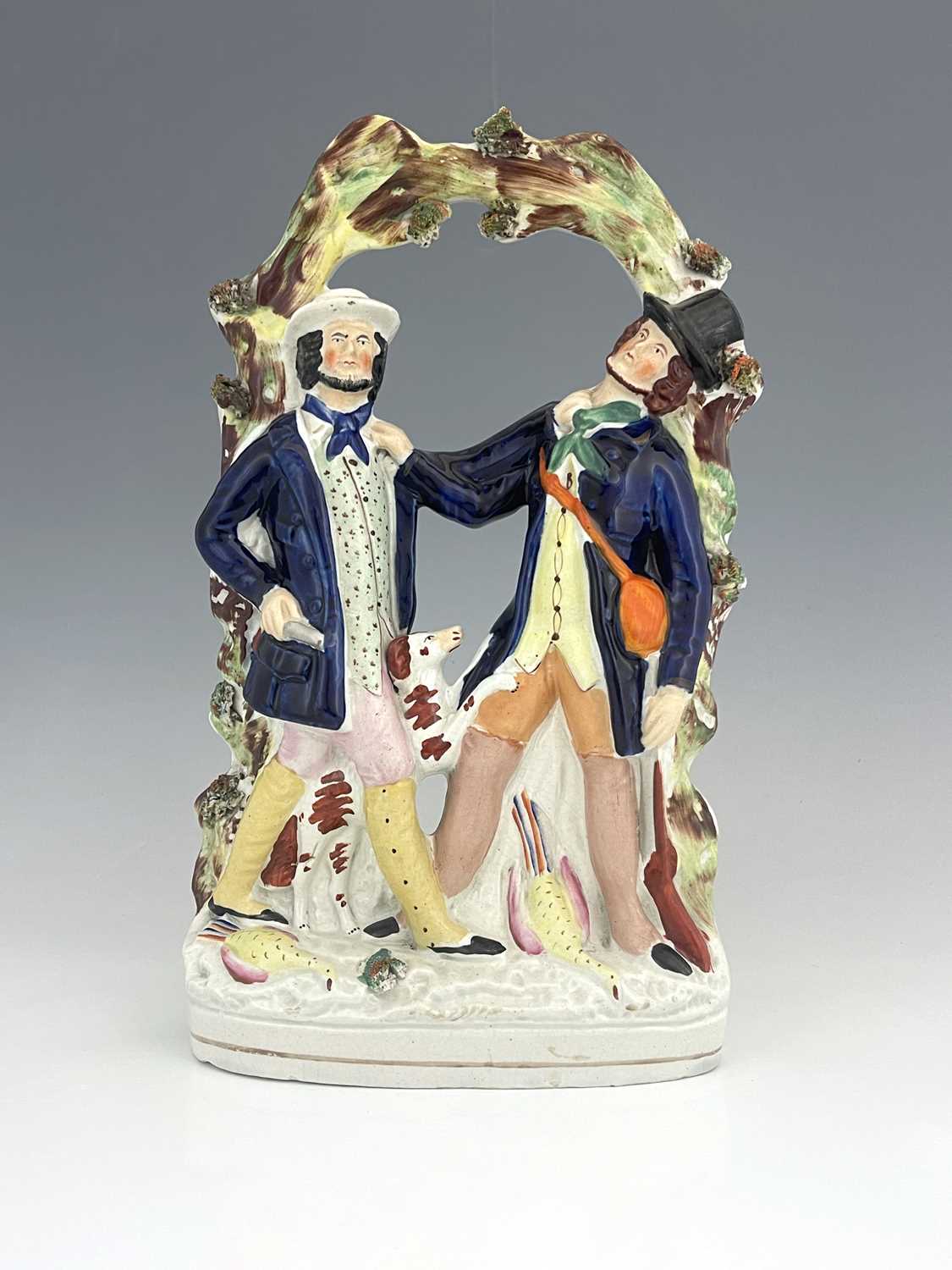 A Staffordshire ceramic flatback group of gentlemen in a scuffle, circa 1850